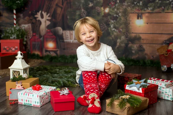 Cute Child Lying Floor Many Decorated Presents — Stock Photo, Image