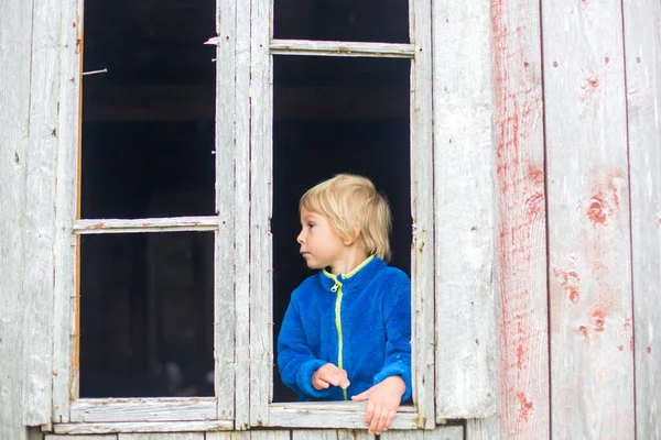 Sad Child Looking Out Window Old Ruined Building — Stockfoto