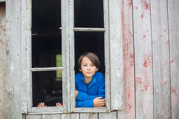Sad Child Looking Out Window Old Ruined Building — Fotografia de Stock