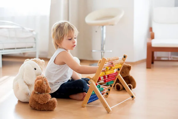 Sweet Blond Preschool Child Toddler Boy Playing Abacus Home Surrounded — Stock Photo, Image