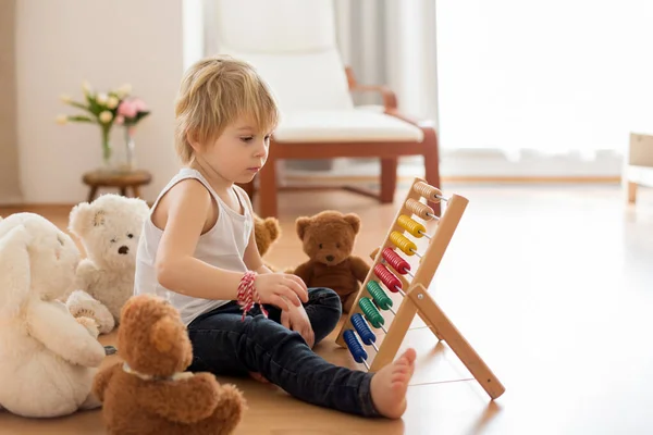 Sweet Blond Preschool Child Toddler Boy Playing Abacus Home Surrounded — Stock Photo, Image