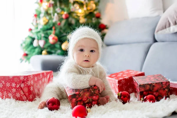 Little Baby Boy White Knitted Onesie Playing Opening Presents Home — Stock Photo, Image
