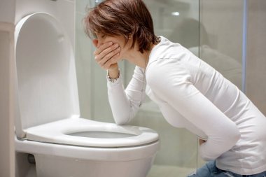 Kadın, kız, hastalık, kusma, hamilelik, zehirlenme ve sabah rahatsızlığı.