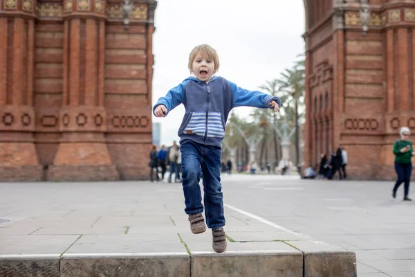 Cute Little Child Toddler Boy Jumping Front Arc Triumph Barcelona — Stock Photo, Image