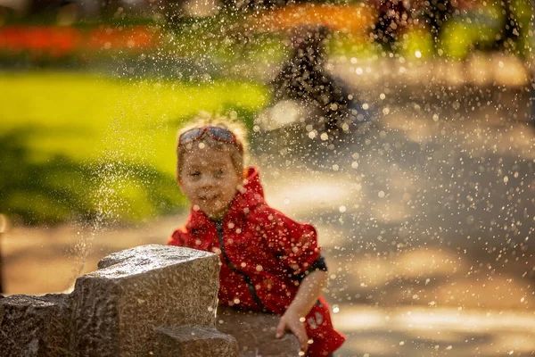 Cute Toddler Child Boy Splashing Water Fountain Park Focus Water — Stockfoto