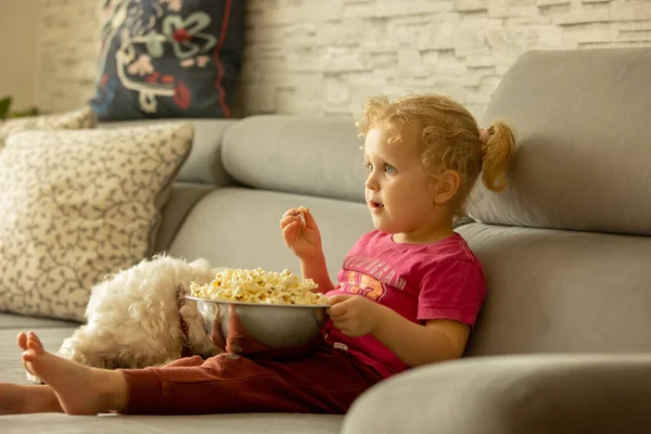 Cute Little Blond Toddler Girl Sitting Front Popcorn Watching Movie — Zdjęcie stockowe