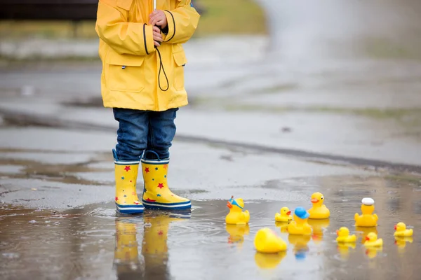 Beautiful Funny Blonde Toddler Boy Rubber Ducks Colorful Umbrella Jumping — 스톡 사진
