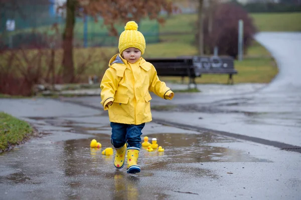 Beautiful Funny Blonde Toddler Boy Rubber Ducks Colorful Umbrella Jumping — Stock Photo, Image