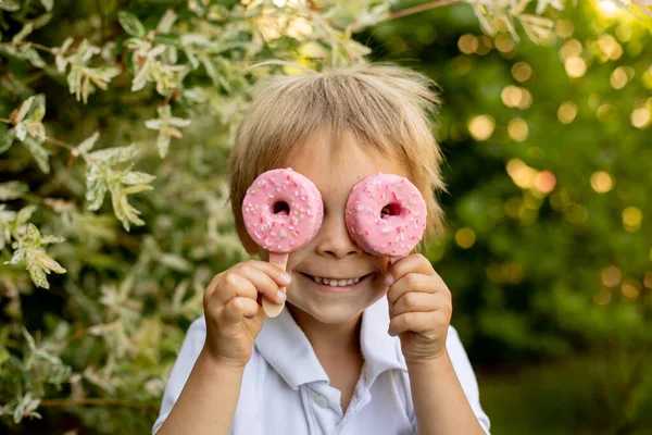 Cute Child Boy Eating Doughnut Ice Cream Backyard His Home — Stockfoto