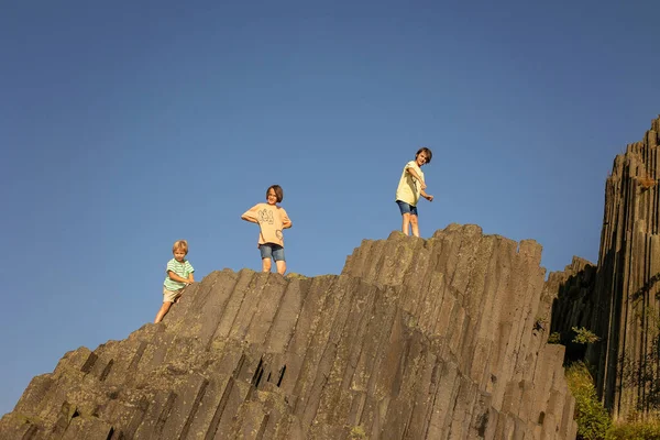 Children Kids Climbing Polygonal Structures Basalt Columns Natural Monument Panska — Stock Fotó