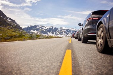 Road with traffic jam, amazing views in Norway to fjords, mountains and other beautiful nature miracles