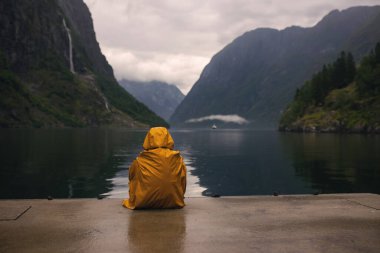 People, children enjoying the amazing views in Norway to fjords, mountains and other beautiful nature miracles