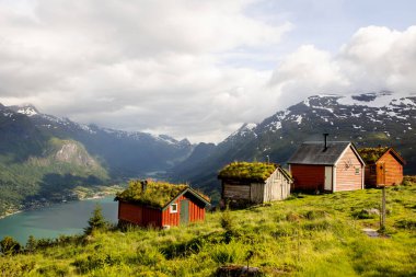 Amazing landscape of houses and fjord Nordfjord from the hiking trail to mount Hoven, splendid view over Nordfjord from the Loen skylift