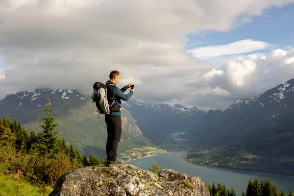 Man Taking Pictures Fjord Hiking Mount Hoven Enjoying Splendid View — Fotografia de Stock