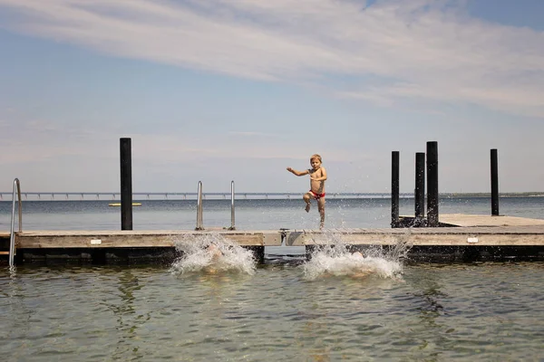 Summer Camp Children Boy Brothers Kids Jumping Sea Bridge — 스톡 사진