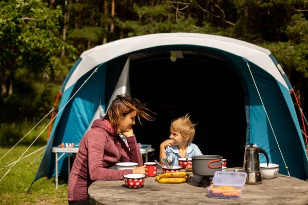 Family Mother Child Having Breakfast Front Pitched Tent Forest While — Zdjęcie stockowe