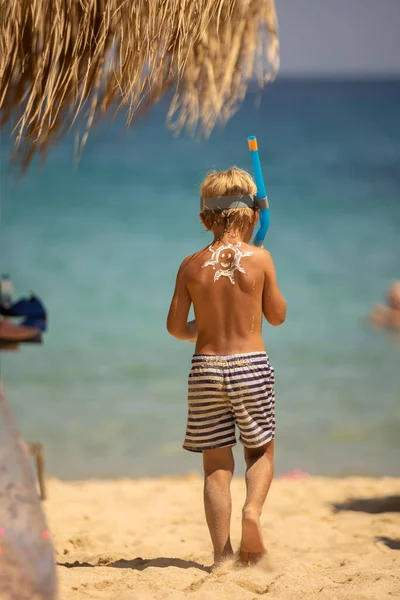 Happy Child Blond Boy Beach Applied Sun Screen Enjoying Summer — Foto de Stock