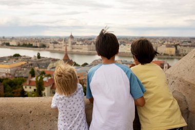 Child, boy, visiting the castle in Budapest on a summer day, Hungary