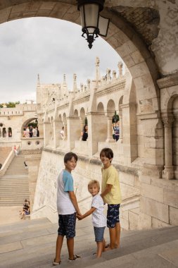 Child, boy, visiting the castle in Budapest on a summer day, Hungary