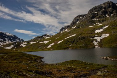 People, children enjoying the amazing views in Norway to fjords, mountains and other beautiful nature miracles