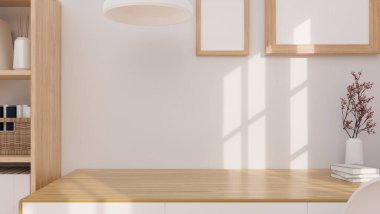 Yakın plan İskandinav ahşap çalışma masası montaj ürünü sergisi ve beyaz duvardaki boş poster çerçevesi için. 3d görüntüleme, 3d illüstrasyon