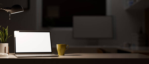 Close-up Portable laptop computer with blank screen mockup and copy space on table in modern dark office studio at night. 3d rendering, 3d illustration