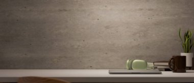 Dizüstü bilgisayarı, kulaklığı, kahve fincanı, aksesuarları ve beton tavan arası duvarında ürün sergisi için yeri olan modern tavan arası çalışma alanı. Montaj için masa üstü. 3d görüntüleme, 3d illüstrasyon