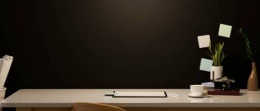 3d rendering, Modern hipster dark workspace with tablet touchpad, accessories and copy space on table over black wall. 3d illustration