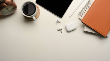 Modern minimal white workspace with office supplies and copy space for product display. top view