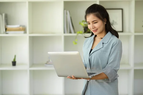 Professional Asian Female Manager Standing Office Holding Open Laptop Computer — Stock Photo, Image
