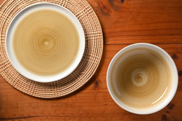 Kitchenware Empty Minimalist Ceramic Plate Bamboo Placemat Bowl Wooden Background — Stock Photo, Image