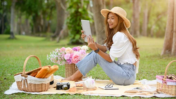 Rear View Charming Asian Young Woman Reading Online Book Tablet Royalty Free Stock Photos