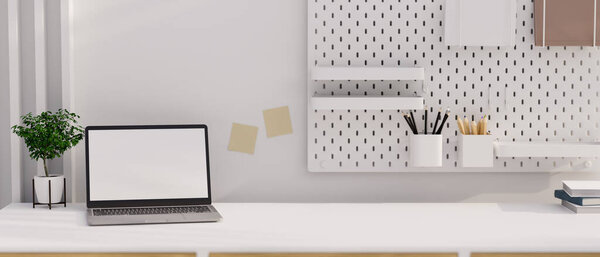 Modern white workspace interior design with laptop blank screen mockup, accessories and copy space on white tabletop, white shelves on white wall. 3d rendering, 3d illustration