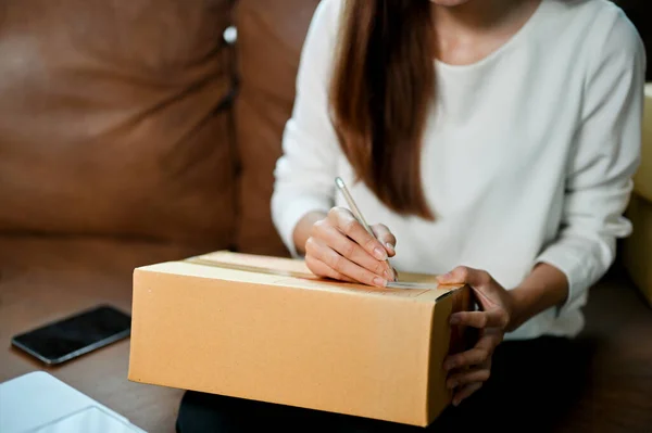 Female Writing Address Cardboard Box Female Online Shop Owner Preparing — Stock Fotó