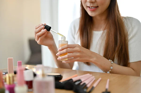 Beautiful Female Blogger Reviews Beauty Product Testing Skincare Serum Attractive — Zdjęcie stockowe