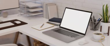Modern office desk workspace with notebook laptop computer white screen mockup and office supplies. 3d rendering, 3d illustration