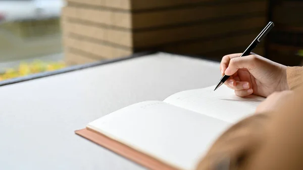 Close Image Female Hand Holding Pen Writing Something Her Empty — Photo