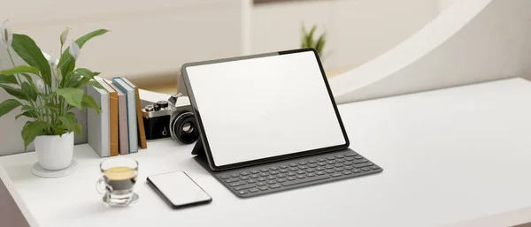 Minimal white office desk workspace with portable tablet blank screen mockup, wireless keyboard, smartphone, coffee cup and decor. 3d rendering, 3d illustration