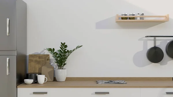 A modern wooden kitchen tabletop with decor plant, kitchenware and copy space for your product display over the white wall. close-up image. 3d rendering, 3d illustration