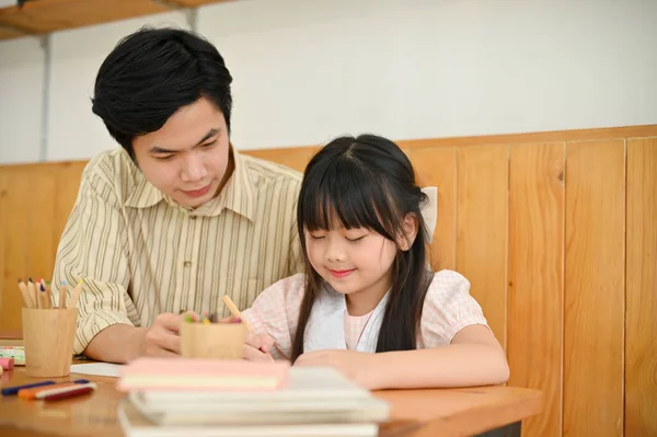 Lovely Cute Young Asian Girl Doing Homework Enjoys Drawing Something — Stock fotografie