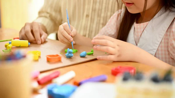 Cute Little Asian Girl Sculpting Colorful Clay Making Cute Flower — Stockfoto