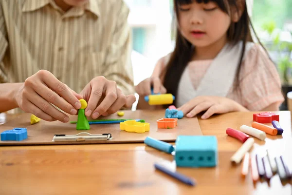 Happy Asian Dad Daughter Enjoys Moulding Colorful Clay Play Dough — Fotografia de Stock