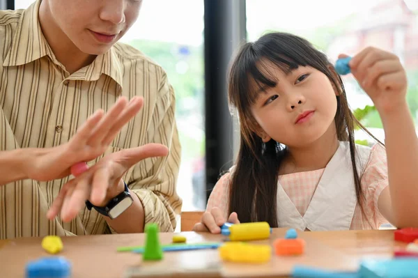 Cute Young Asian Girl Enjoys Moulding Colorful Clay Plasticine Her — Stockfoto