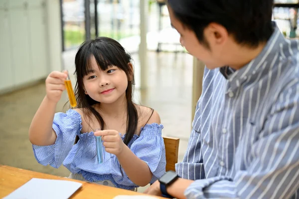 Charming Bright Young Asian Girl Holding Test Tube Studying Science — Stockfoto