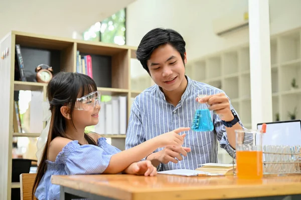 Handsome Asian Male Teacher Teaching Showing Science Experiment Young Student — Foto de Stock