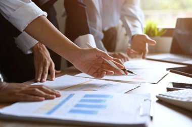 Close-up hands image, Professional business people in the meeting, analyzing and planning financial and accounts strategy together.