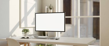 Minimum beyaz ofis çalışma alanı iç tasarımı bilgisayar beyaz ekran modeli ve pencereye dayalı beyaz masa dekorasyonu. 3d görüntüleme, 3d illüstrasyon