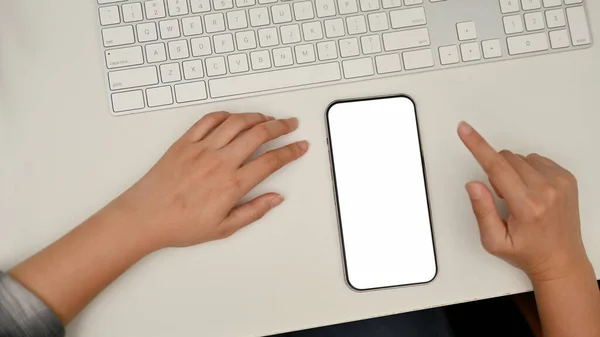 Female Sits Her Working Desk Smartphone White Screen Mockup Keyboard — Stock Photo, Image