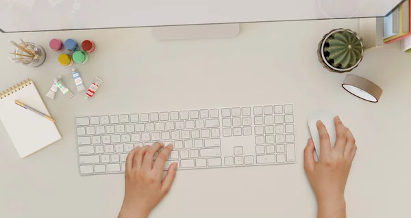 现代的白色写字台工作台 配有办公室配件 还有一只女性的手在电脑键盘上打字 顶部视图 — 图库照片
