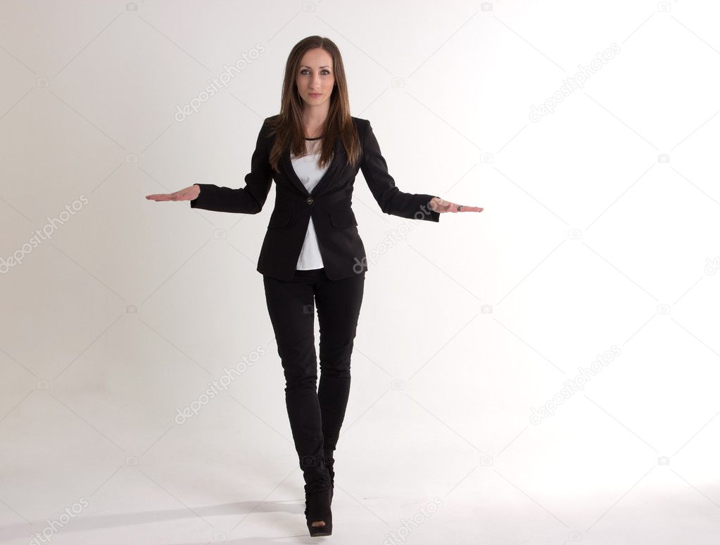 Serious Business Woman is Showing a Size with Hands Isolated on White Background